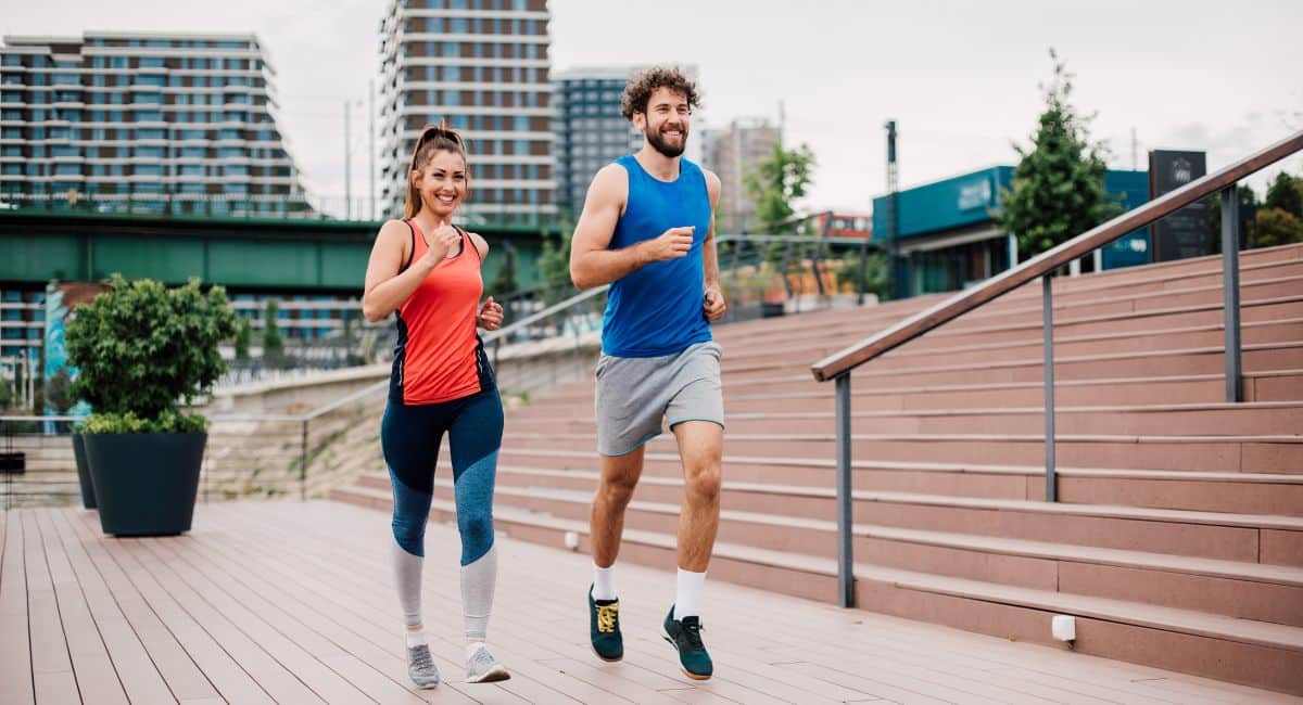 smiling couple jogging outdoor
