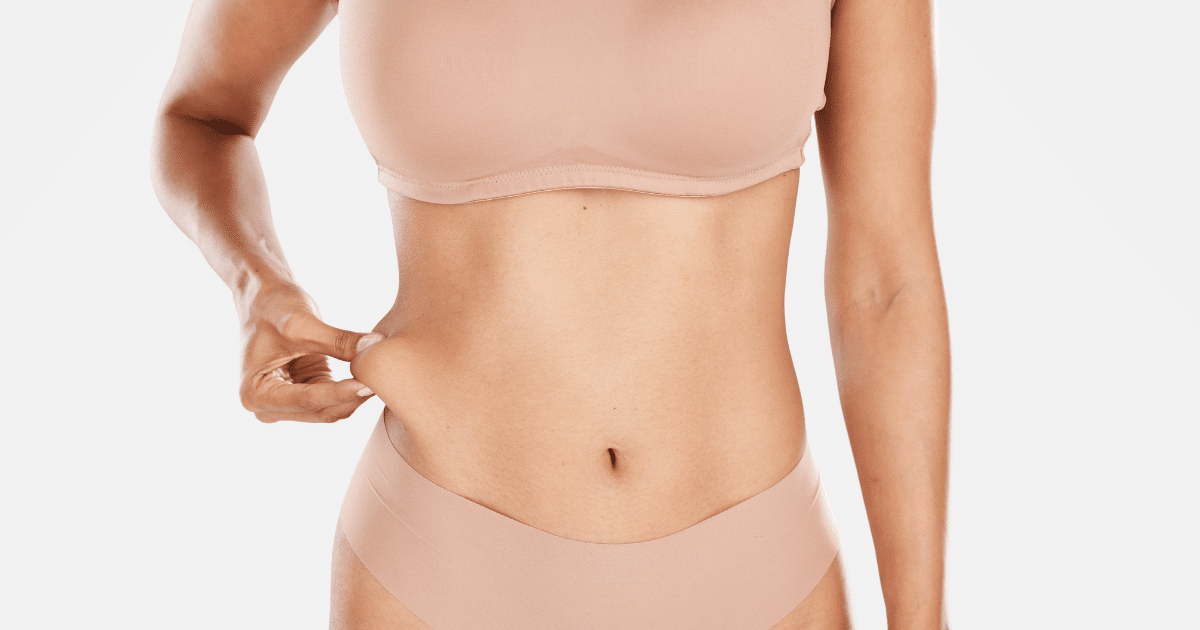 a woman's body displaying her belly's side fat