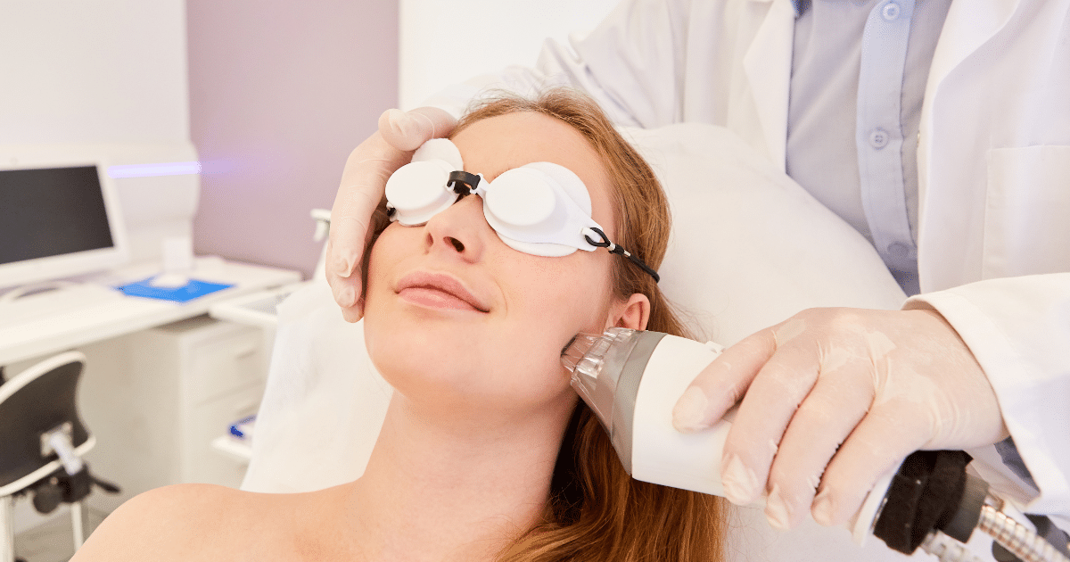 a woman having moxi laser treatment